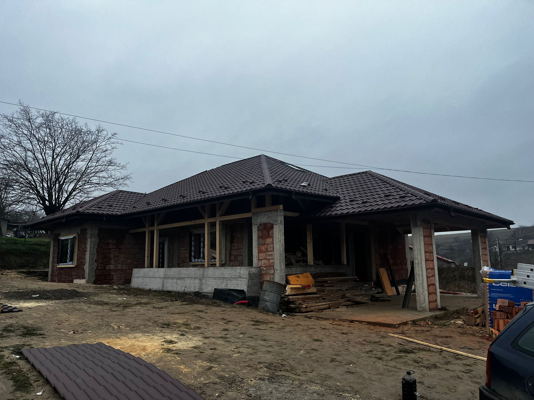 Casa noua cu acoperis din tigla metalica maro finalizat in judetul Iasi